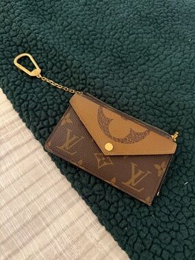 Louis Vuitton Monogram Key Pouch in Brown/Tan